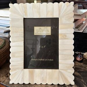 Made in India 8” by 10” inlaid bone frame inset is 5” by 7” for photo wood stand